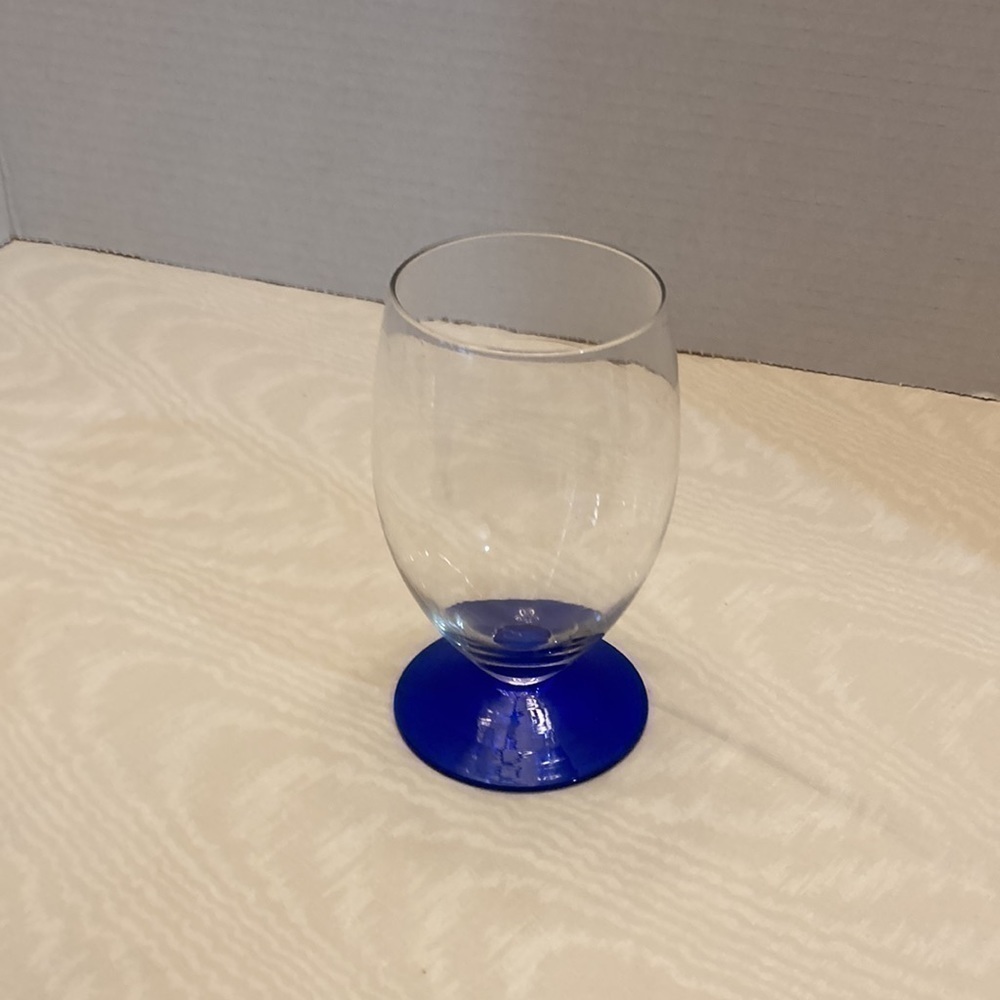 Footed Juice Glass, 8 oz., Clear Chrystal with Cobalt Blue Stem.  5” by 3”.
